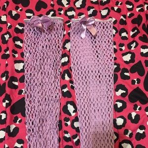 Purple fishnets with bow